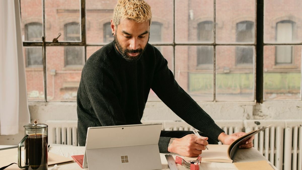 Small business owner working on a laptop